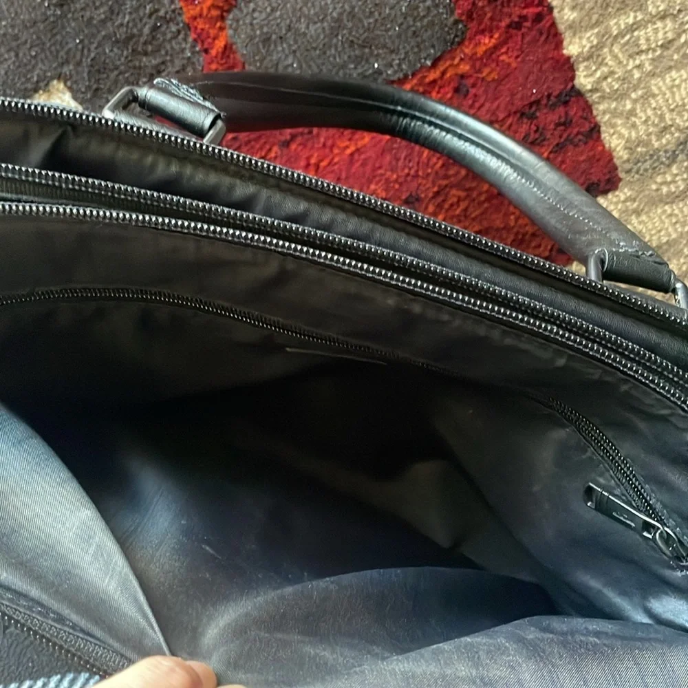 Tumi Canvas Black Laptop Bag with Carbon Fiber Accents